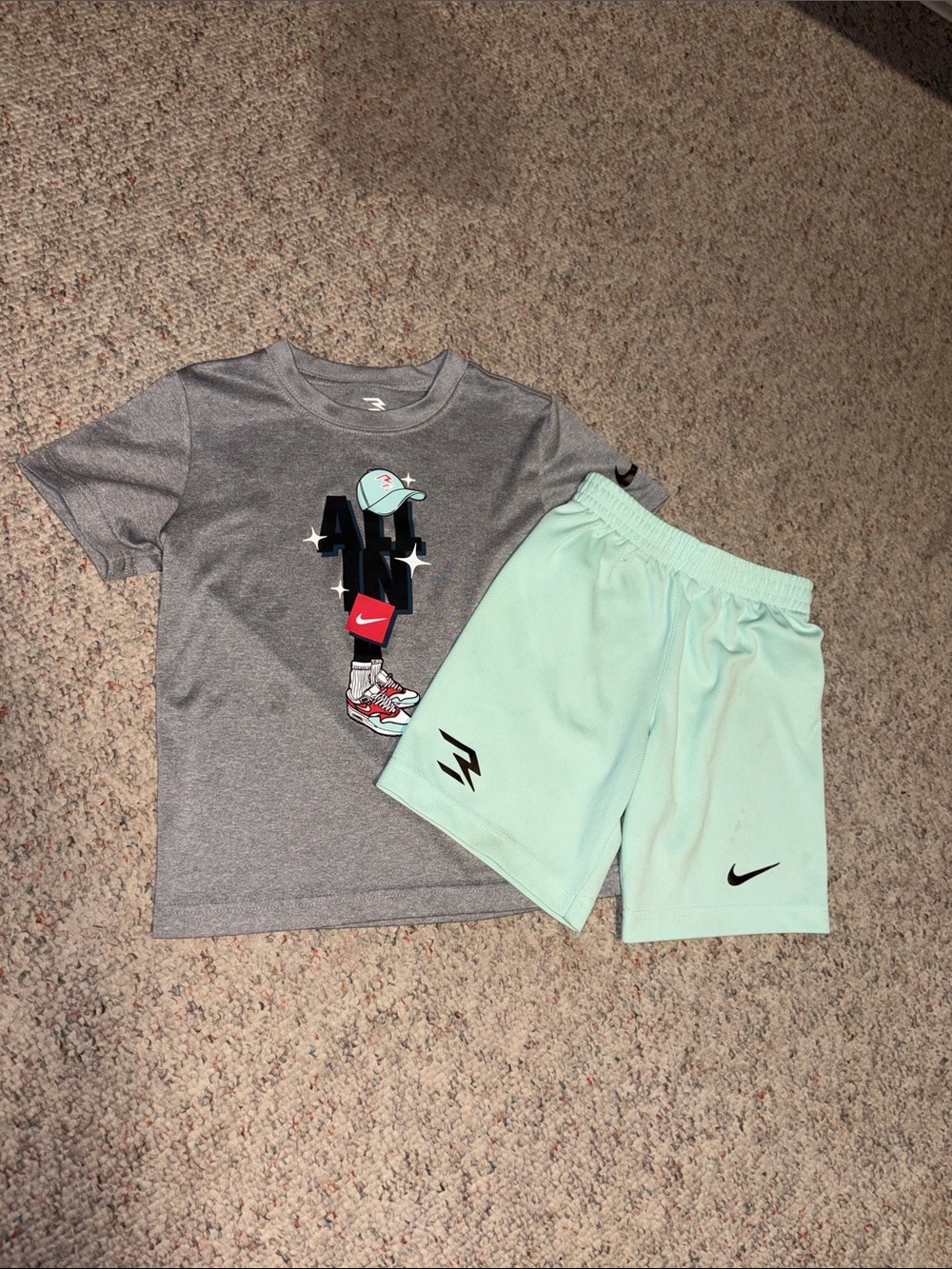 Nike Kids Mint Green Athletic Shorts with Black Swoosh